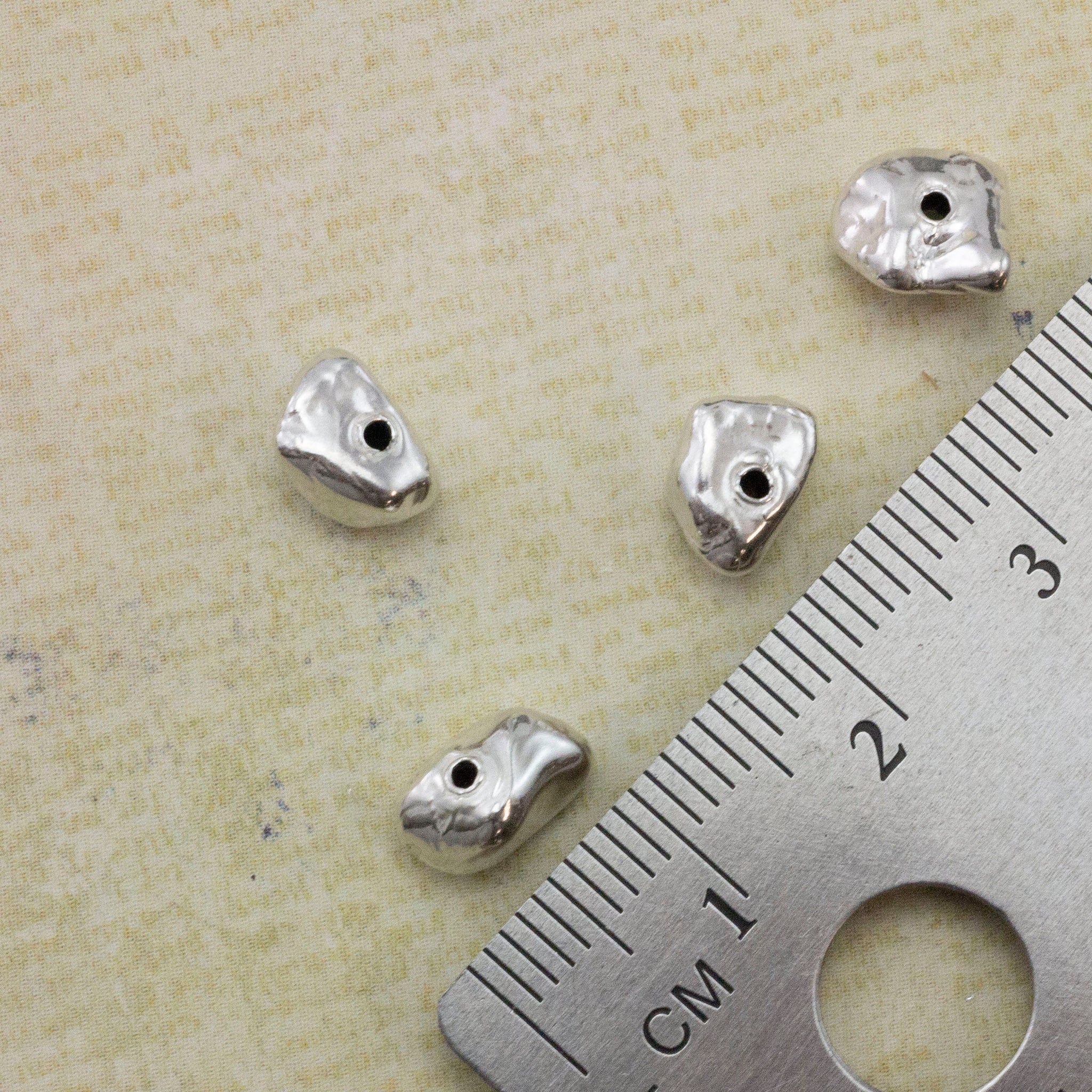 Silver nugget beads deals