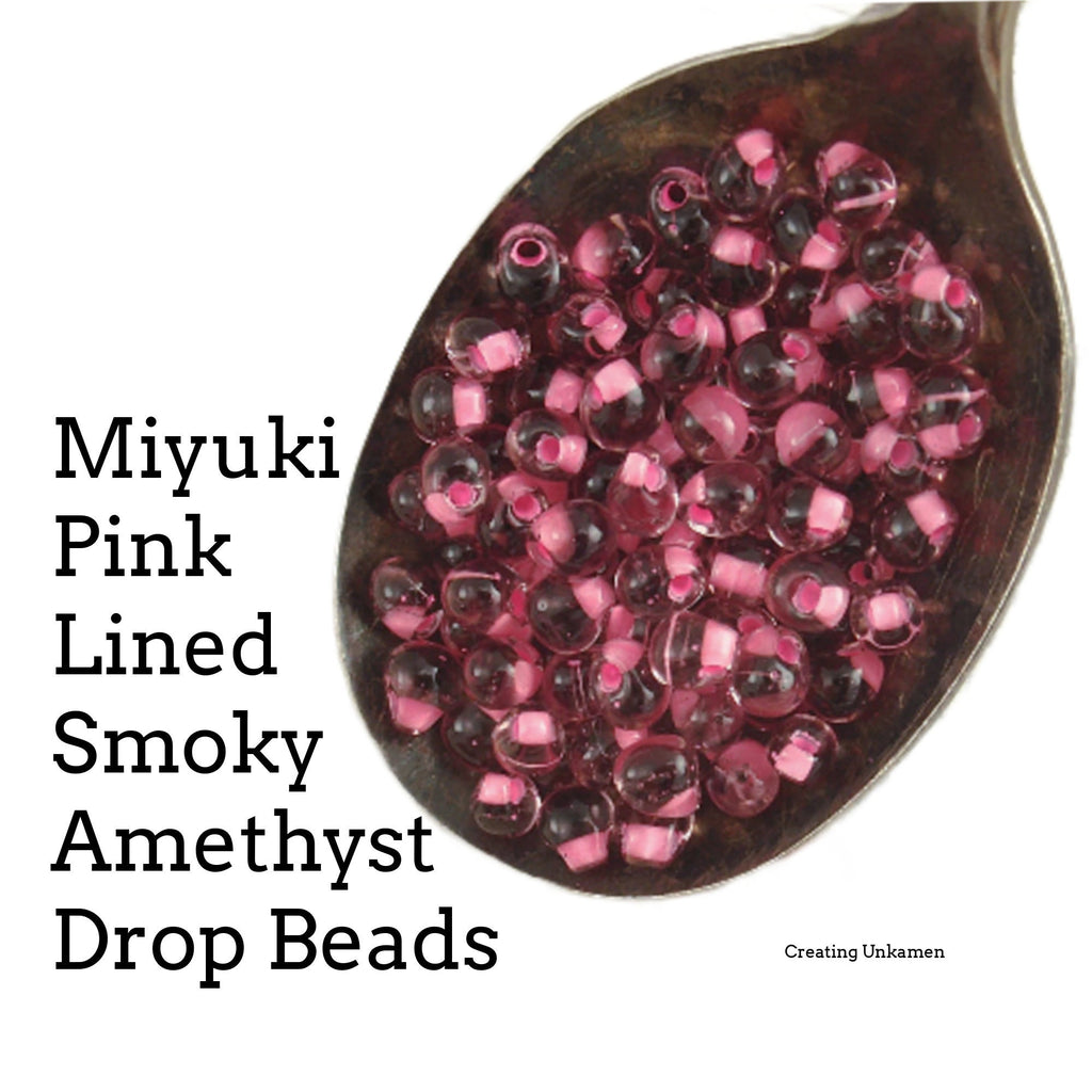 Miyuki DPF-03 Pink Lined Smoky Amethyst Drop Beads - 3mm X 4mm