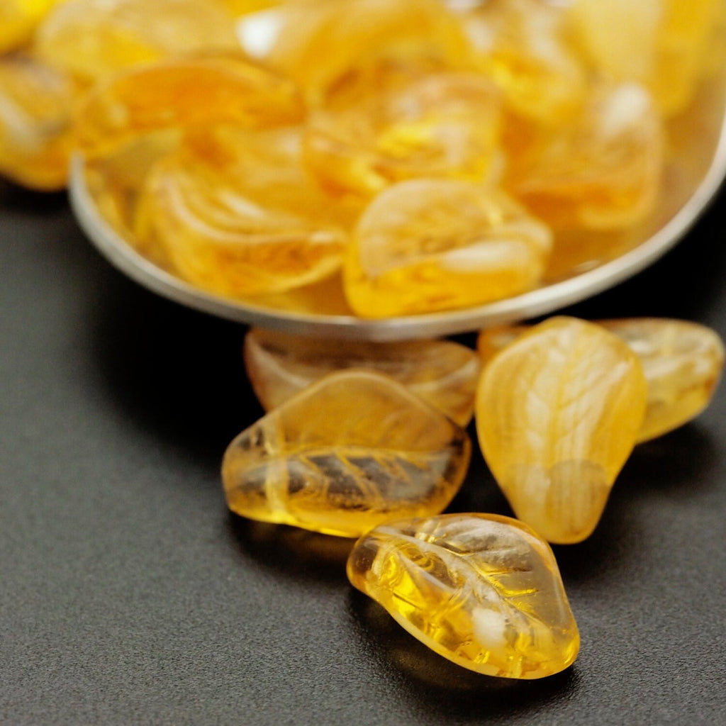 10 Glow in the Dark Topaz Czech Leaf Beads - 14mm x 9mm