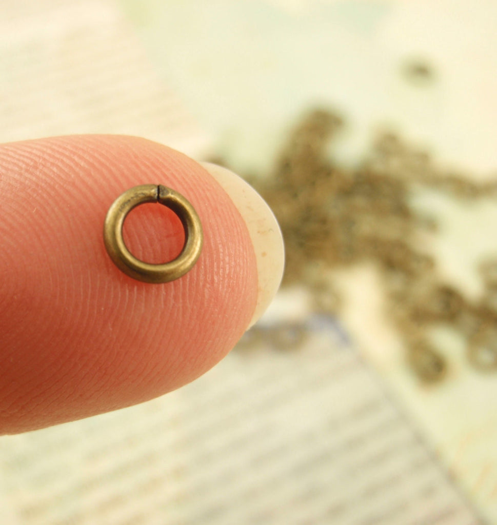 100 - 18 gauge 5mm OD  Jump Rings - Silver Plate, Gold Plate, Antique Silver, Antique Gold, Gunmetal,  Best Commercially Made