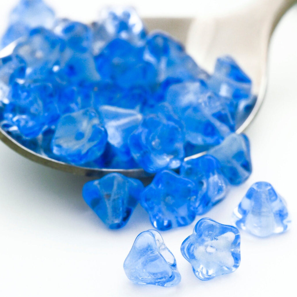 15 Glow in the Dark Sapphire Blue Bell Flowers Czech Beads - 8mm x 6mm 100% Guarantee