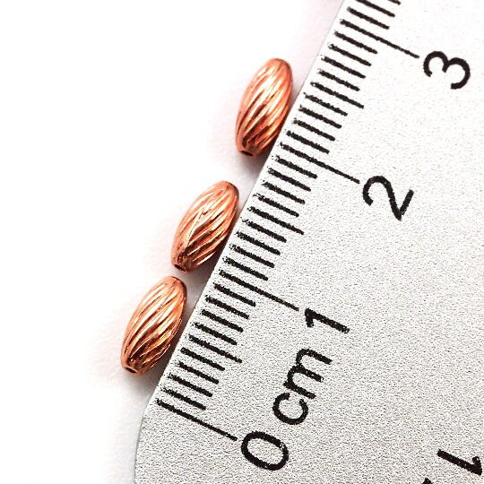 50 Twisted Corrugated Oval Copper Beads - Clear Coated to Prevent Tarnish - 100% Guarantee in 5mm, 7mm, 9mm