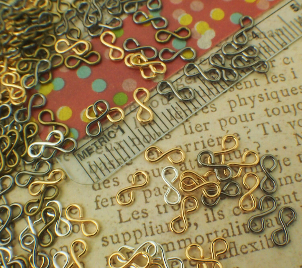 25 Infinity Figure Eight Links -Version I - 7mm x 3mm - Silver Plate, Gold Plate, Gunmetal or Antique Gold - 100% Guarantee
