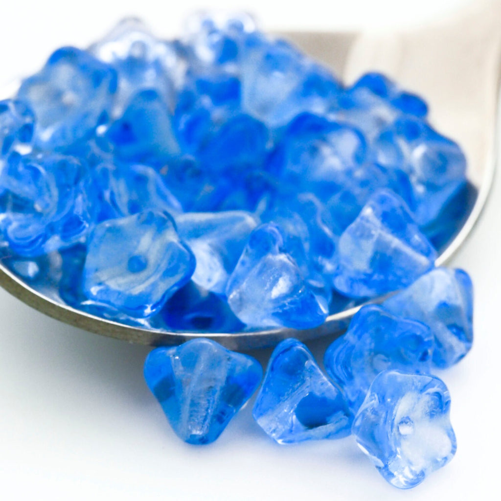 15 Glow in the Dark Sapphire Blue Bell Flowers Czech Beads - 8mm x 6mm 100% Guarantee