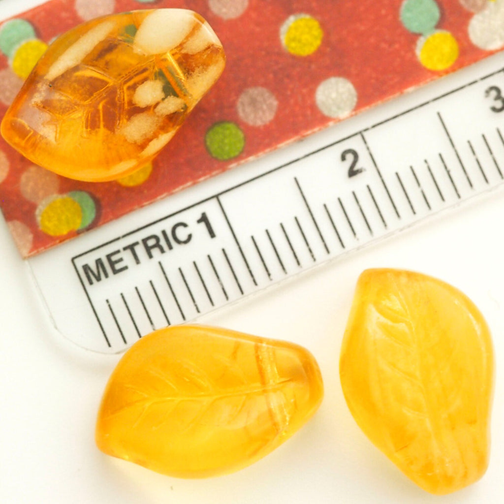 10 Glow in the Dark Topaz Czech Leaf Beads - 14mm x 9mm