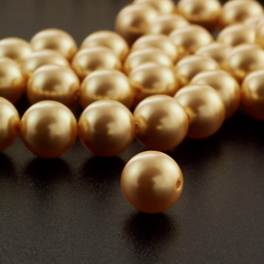 10 - 10mm Bright Gold Swarovski Pearls