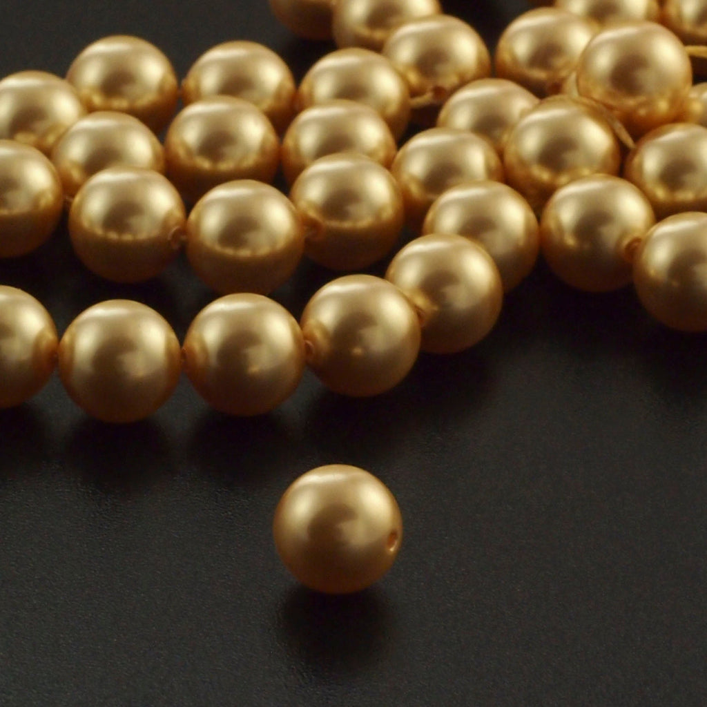 10 - 10mm Bright Gold Swarovski Pearls